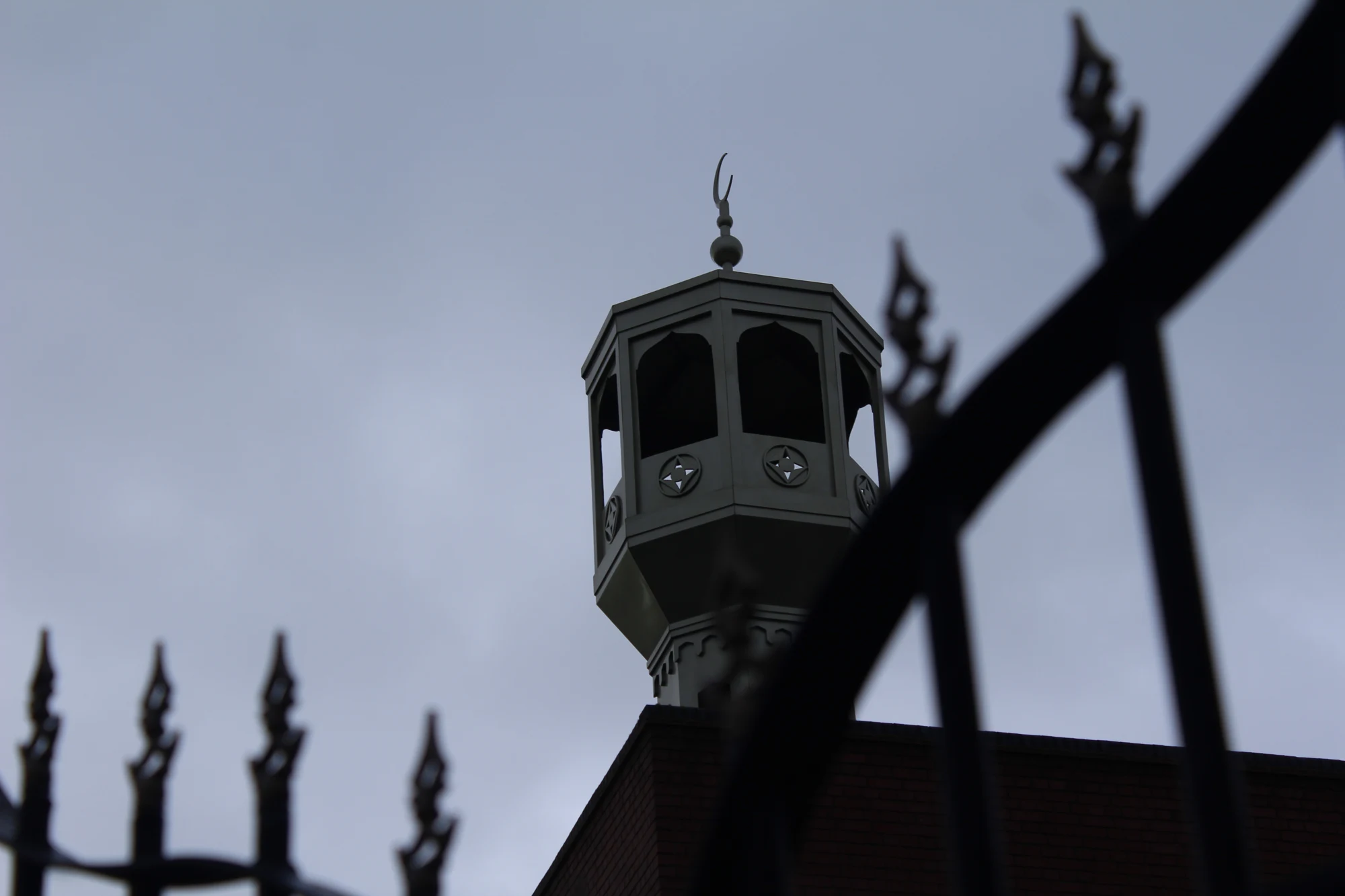 Architecture — tower framed by railings
